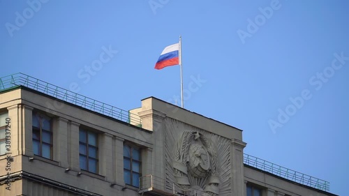 Russian flag by the State Duma in Moscow. Russian politics concept. photo