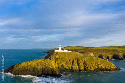 Aerial view of Strumble Head Lighthouse, near Goodwick, Pembrokeshire, Dyfed, Wales, UK photo