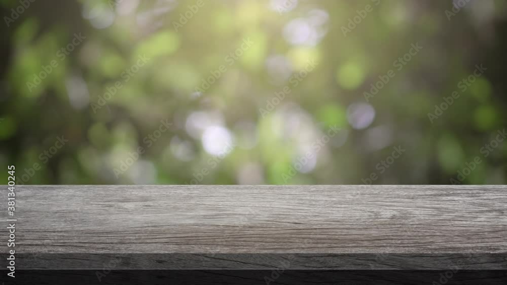 Wood Table and Chair, Wood table bar and nature tree bokeh blurred background at morning time and beautiful nature sun light, Top wood table space area for products shows. 4K UHD. Video Clip. Wood Table and Chair, Wood table bar and nature tree bokeh blurred background at morning time and beautiful nature sun light, Top wood table space area for products shows. 4K UHD. Video Clip.
