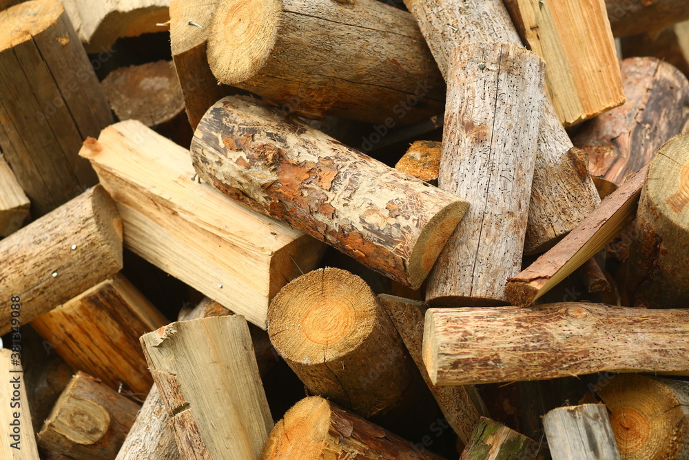 Piles of wood logs, timber firewood background, industrial concept Piles of wood logs, timber firewood background, industrial concept