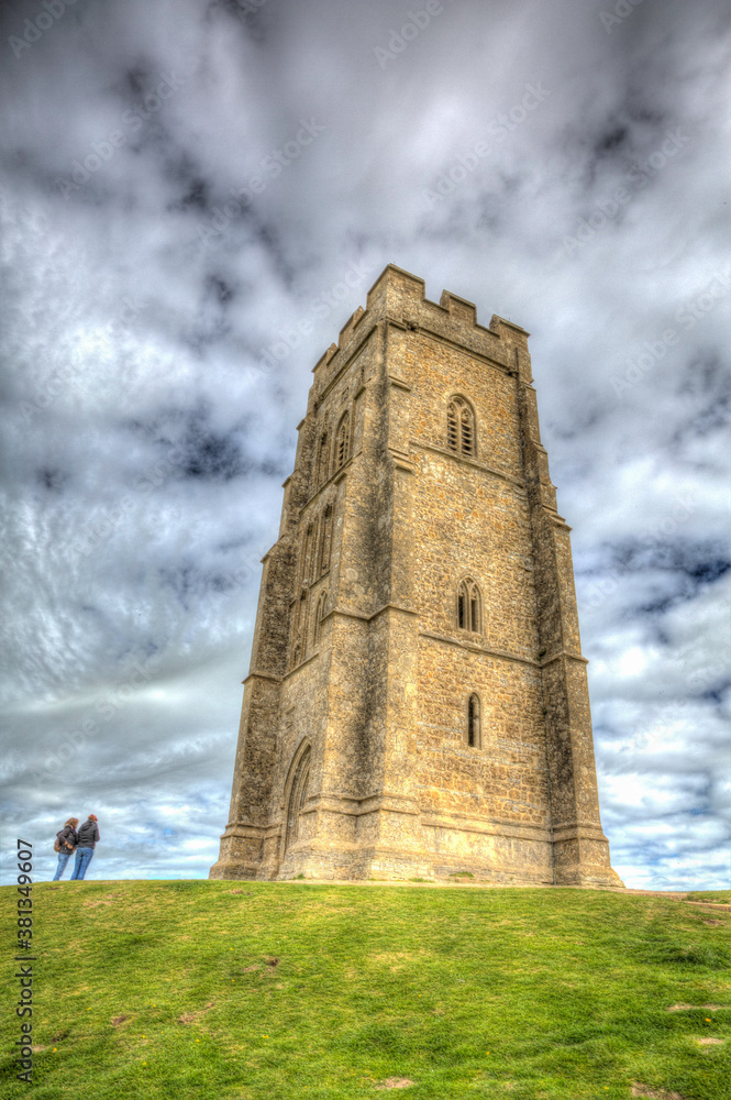 Glastonbury Tor Somerset historic landmark and tourist attraction portrait view Glastonbury Tor Somerset historic landmark and tourist attraction portrait view