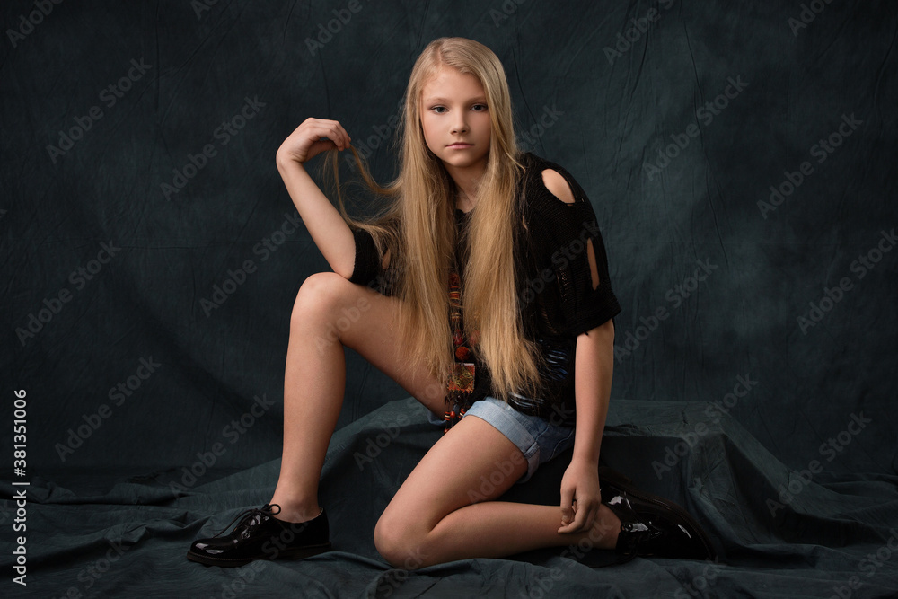 Beautiful blonde girl in jean shorts Stock Photo Adobe Stock