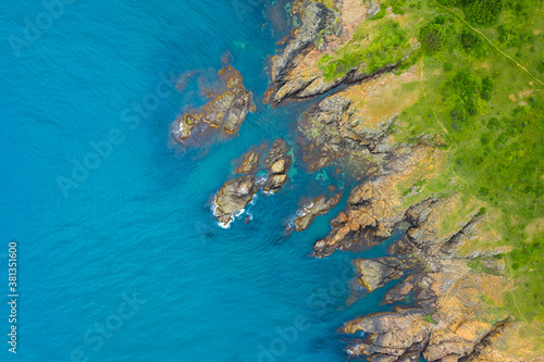 Aerial view of picturesque coastline with beautiful cliffs, surrounded by clear blue sea water, Black sea coast, Bulgaria