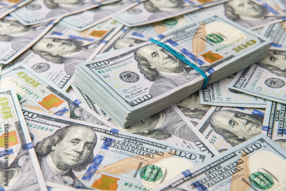Stack of one hundred dollar bills close-up. Stack of one hundred dollar bills close-up.