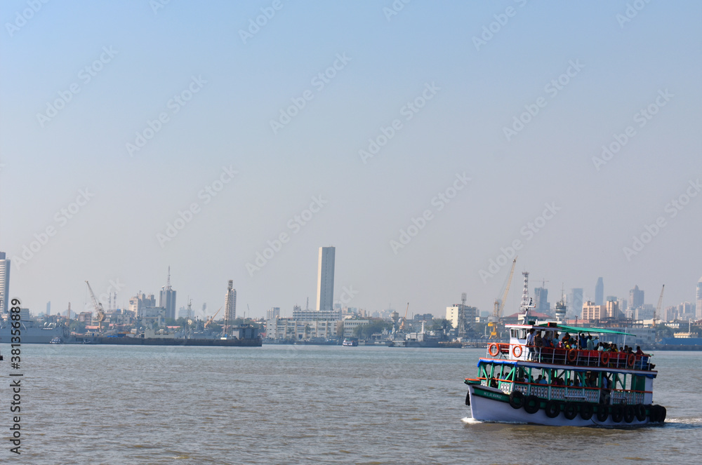 boat floating near the mumbai shore