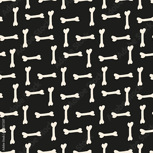 Seamless pattern with bones on black background. Vector image.