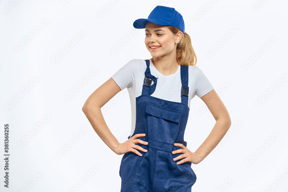 Woman in working uniform blue cap delivery courier delivery service
