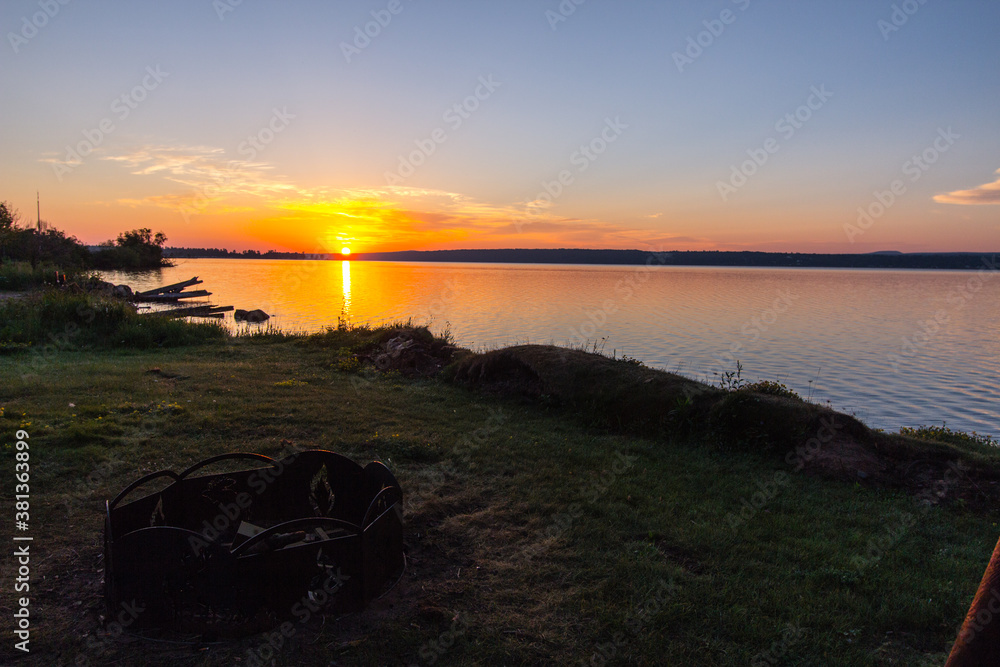 Lake Superior Sunrise. Sunrise over the coast of Lake Superior on a beach in the Keweenaw Bay of the Upper Peninsula of Michigan.