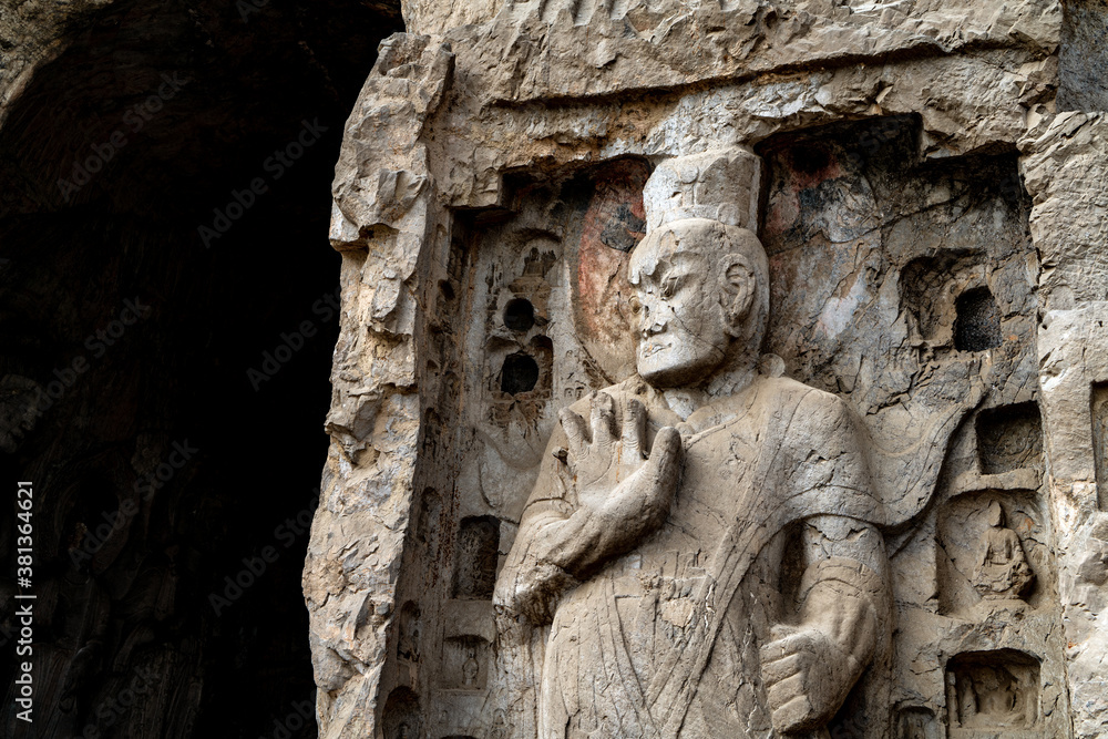 Longmen Grottoes with Buddha's figures are Starting with the Northern Wei Dynasty in 493 AD. It is one of the four notable grottoes in China.