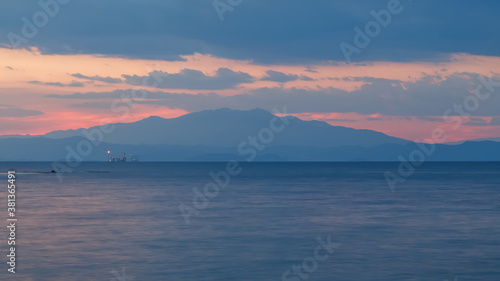 Sea and sky after sunset. Soft blue and pink colors. Calm  tranquility and harmony. Thasos island  Greece.