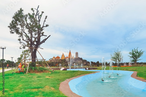 KANCHANABURI THAILAND - JUNE 26: A beautiful view of the cafe and the newly created food with the famous Wat Tham Sua Temple in the background at Ananda coffee and restaurant on June 26,2020