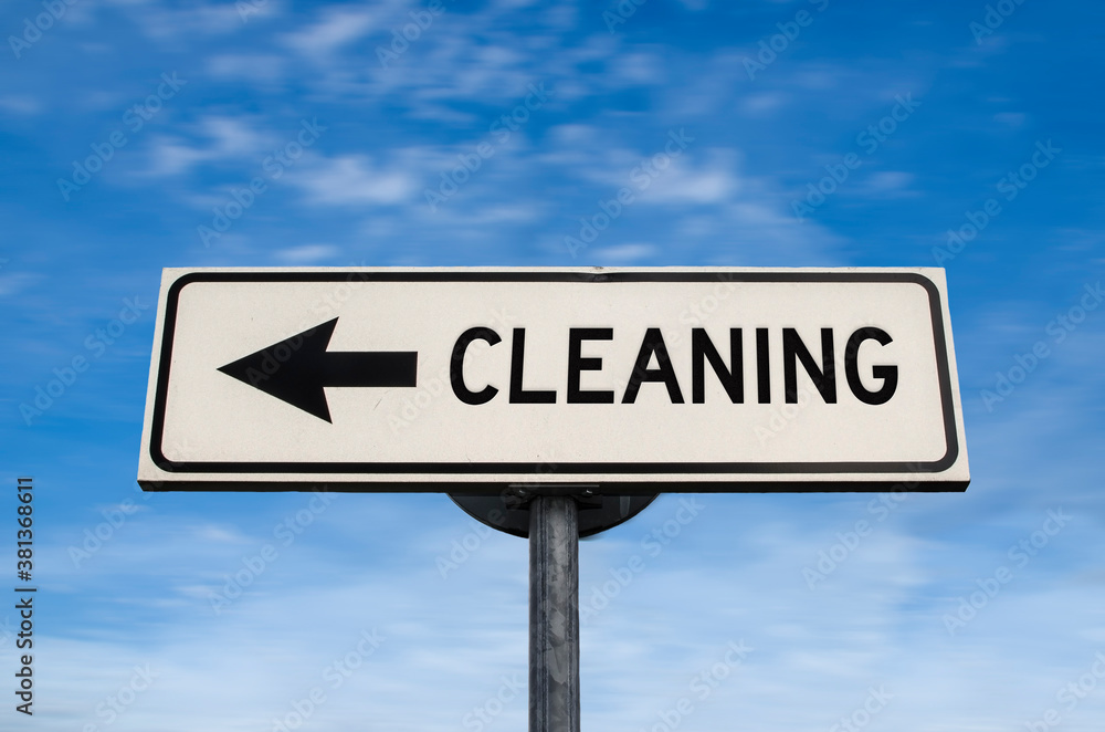 Cleaning road sign, arrow on blue sky background. One way blank road sign with copy space. Arrow on a pole pointing in one direction. Cleaning road sign, arrow on blue sky background. One way blank road sign with copy space. Arrow on a pole pointing in one direction.
