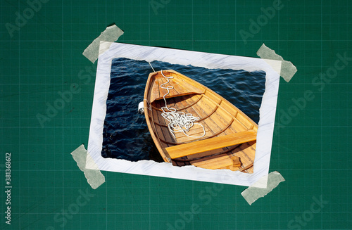 Paper cutout photo frame taped on classic green cutpad with cover tape 