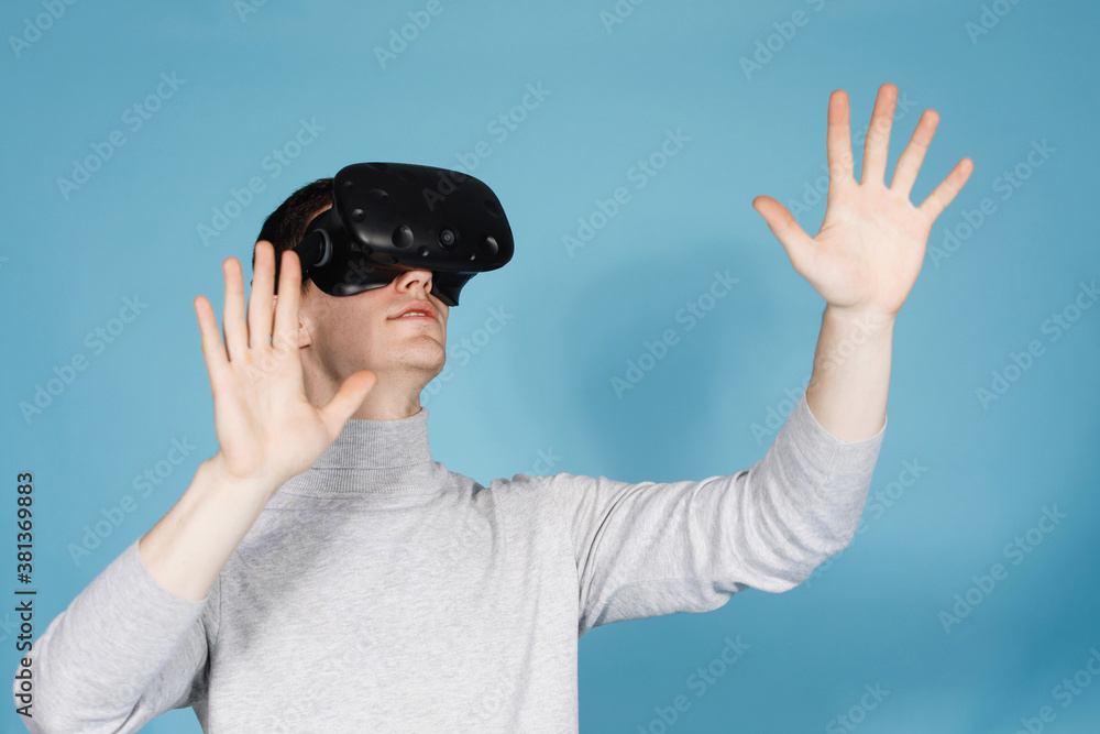Guy plays with virtual reality glasses Guy plays with virtual reality glasses