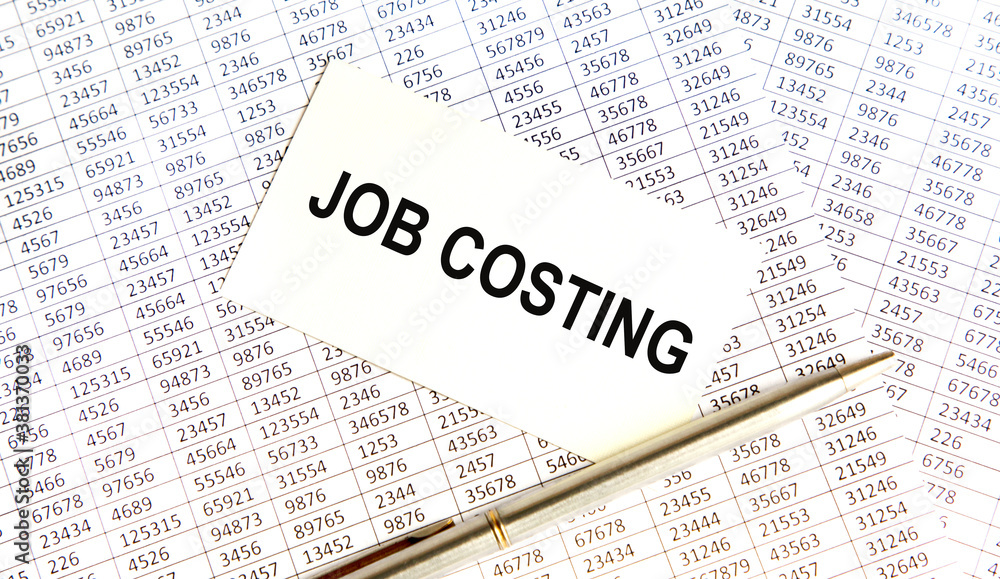 Obraz premium JOB COSTING text on paper sheet with chart, dice, spectacles, pen, laptop and blue and yellow push pin on wooden table - business, banking, finance and investment concept. BUSINESS CONCEPT