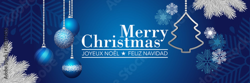 Bannière d’ambiance bleu hivernal pour souhaiter de bonnes fêtes avec un texte en 3 langues : anglais, français et espagnol - traduction : joyeux Noël.