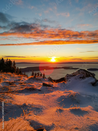 ZAVIZAN - 26.09.2020. Early snow in the Northern Velebit National park in Croatia. Beautiful sunset and view of the Adriatic sea