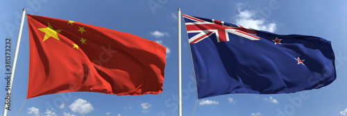 Flying flags of China and New Zealand on sky background, 3d rendering