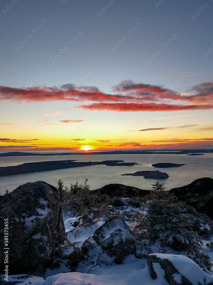 Obraz premium ZAVIZAN - 26.09.2020. Early snow in the Northern Velebit National park in Croatia. Beautiful sunset and view of the Adriatic sea