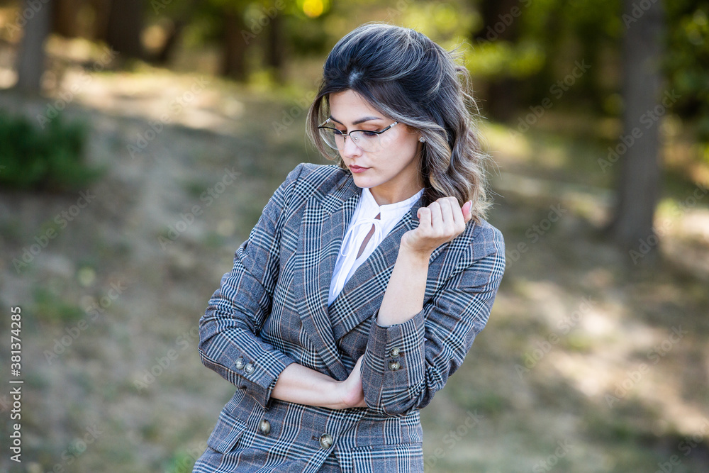 Portrait of beautiful elegant business woman. Natural beauty. Blonde woman with long healthy curly hair and clear skin. Portrait of beautiful elegant business woman. Natural beauty. Blonde woman with long healthy curly hair and clear skin.