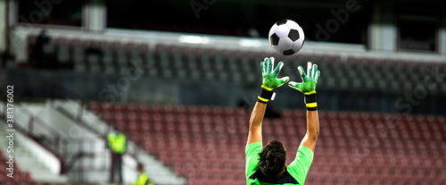 Foto soccer game background goalkeeper catching football