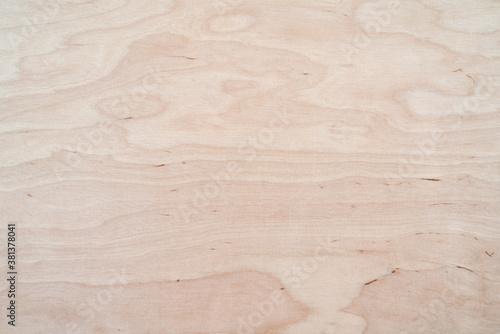 Light plywood texture. Patterned wooden background. Wood product.