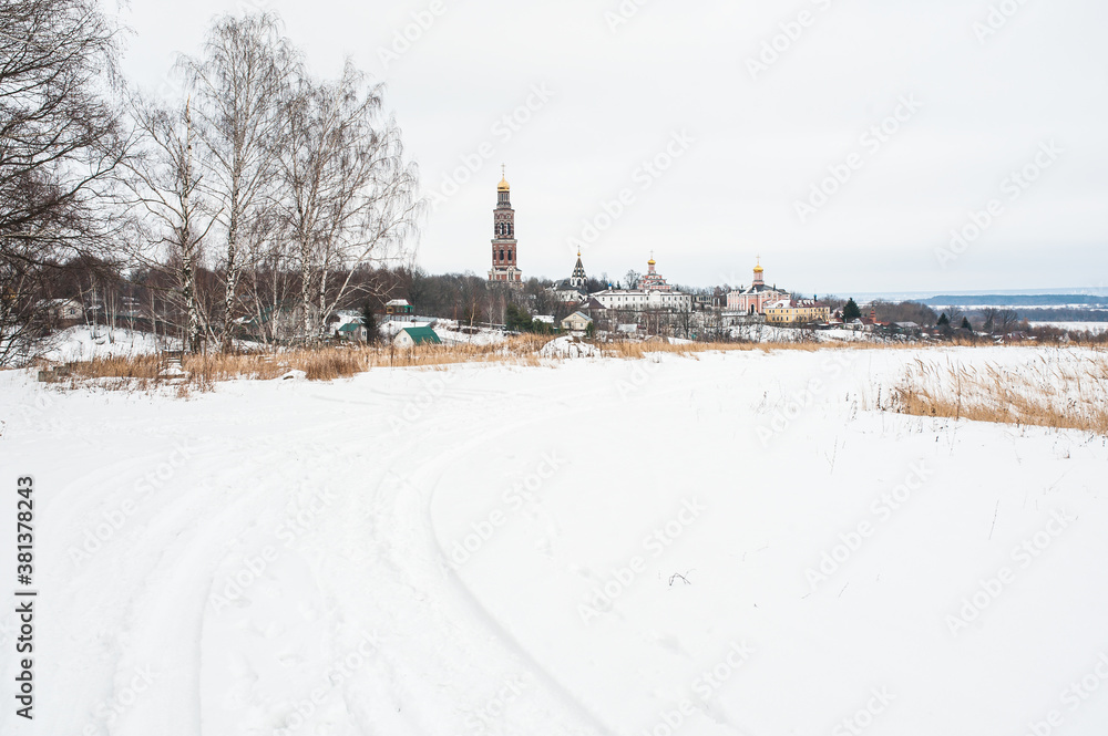 Winter landscape with a view of the monastery