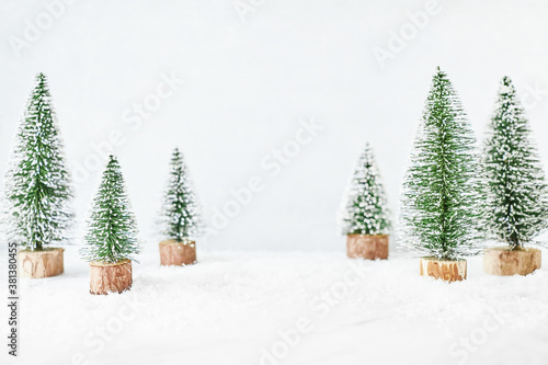 Winter holidays background with faux firs  front view display with copy space