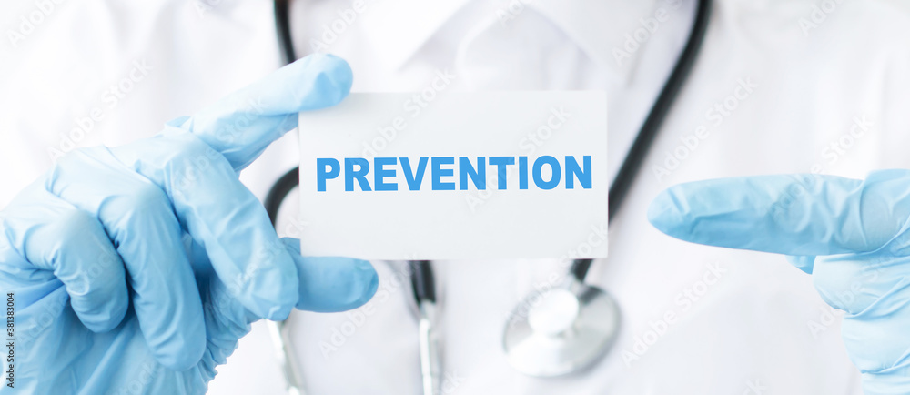 Prevention text on card in the hands of a doctor. Healthcare or prevention concept. Prevention text on card in the hands of a doctor. Healthcare or prevention concept.