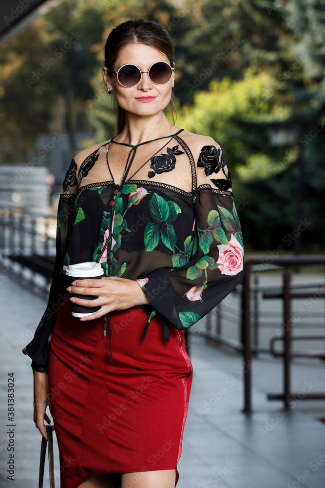 Young stylish fashion woman with mug of coffee Young stylish fashion woman with mug of coffee