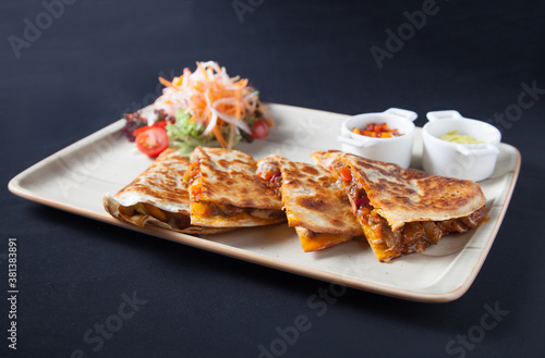 Quesadilla wish salad and sauces