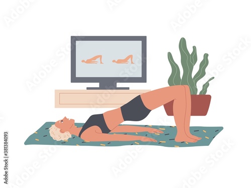 Glute Bridge. Woman performs exercises at home lying on the floor, raising her buttocks leaning on the top of her back and foot