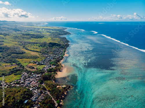 Tropical landscape with ocean and coastline in East Mauritius. Aerial view