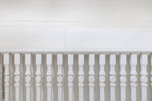 front view of wooden railing or handrails staircase on white wall background