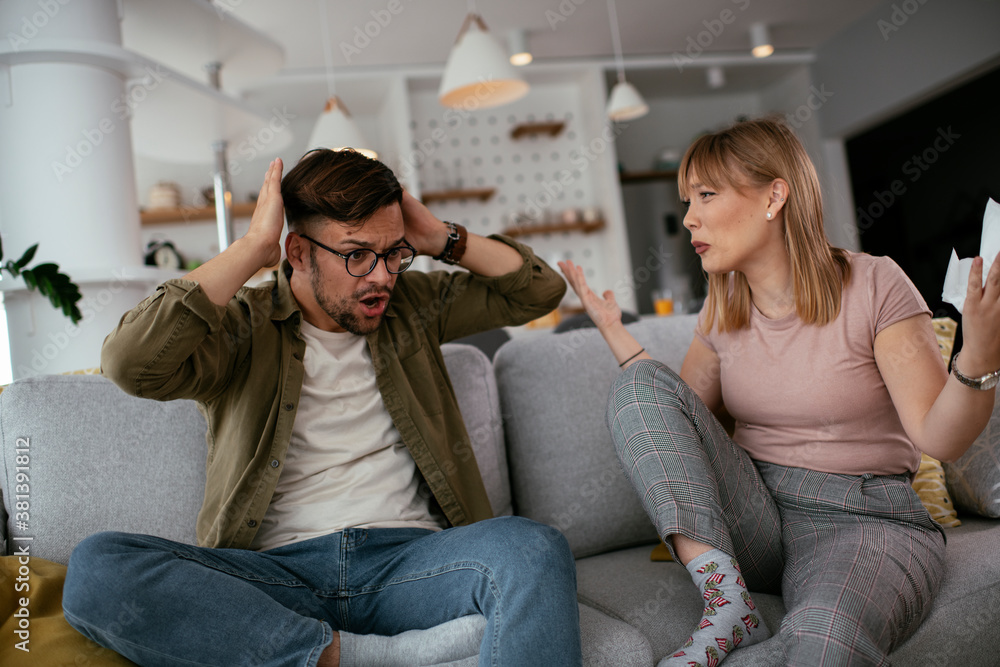 Boyfriend And Girlfriend Are Arguing On The Couch Angry Woman Is Boyfriend And Girlfriend Are Arguing On The Couch Angry Woman Is