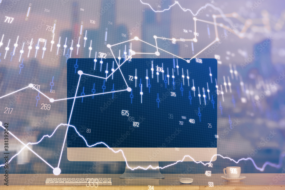 Financial graph colorful drawing and table with computer on background. Multi exposure. Concept of international markets. Financial graph colorful drawing and table with computer on background. Multi exposure. Concept of international markets.