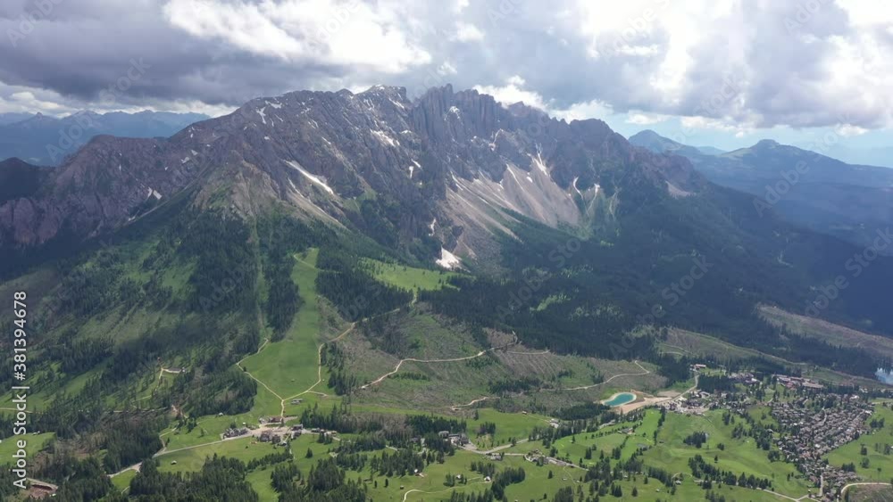 Panoramic drone flight of mountain valley in the Dolomites in Italy
Panoramic drone flight of mountain valley in the Dolomites in Italy