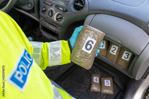 Police seize drug in stash spot of a car during traffic stop