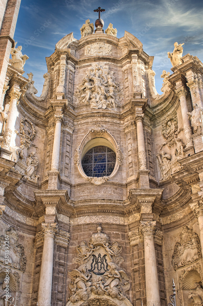 Baroque style sculptural facade detail of the cathedral of Valencia, Spain