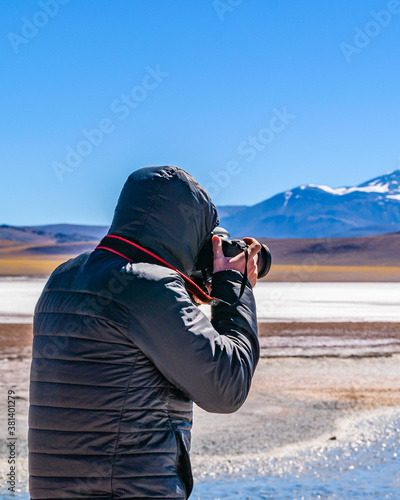 Wallpaper Mural Man Taking Photos, Brava Lagoon, La Rioja, Argentina Torontodigital.ca