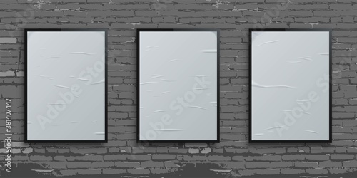 White vertical glued blank billboards on brick wall background