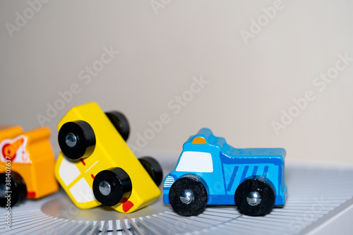 The concept of the car accident, the yellow car overturned.