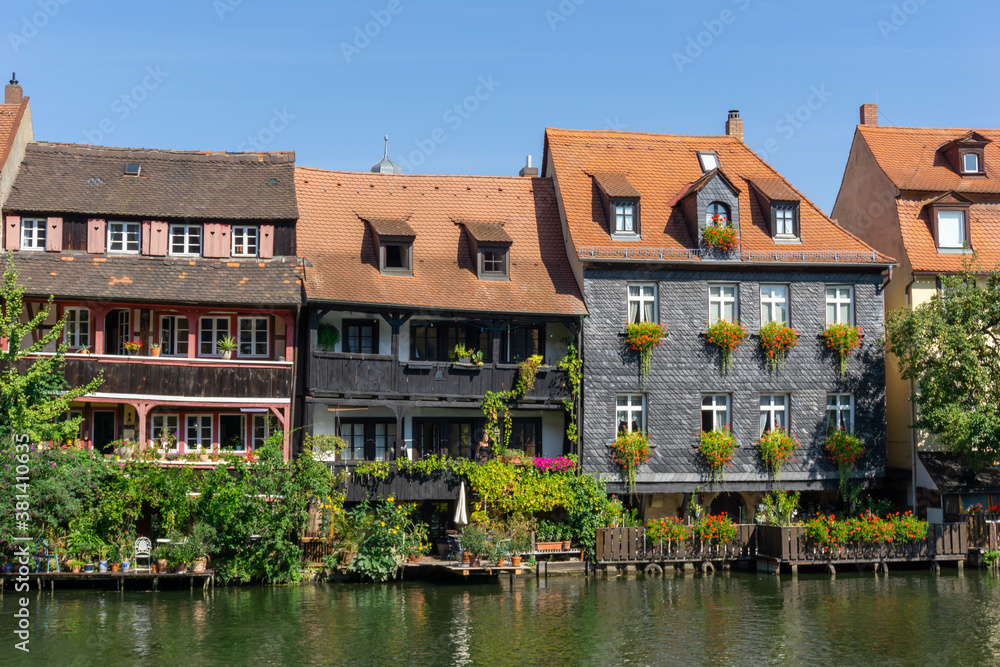 historic and colorful half-timbered houses on the banks of the Regnitz river in Bamberg in Bavaria