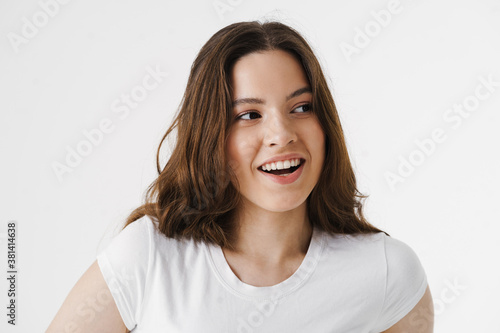 Pretty young smiling woman wearing casual clothes