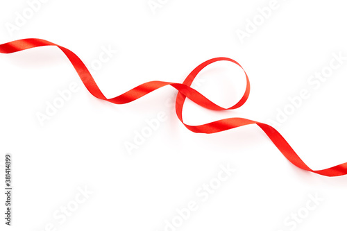 red satin ribbon with curls isolated on white background