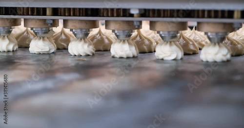 Wallpaper Mural the process of depositing marshmallows or profiteroles on the jigging machine Torontodigital.ca