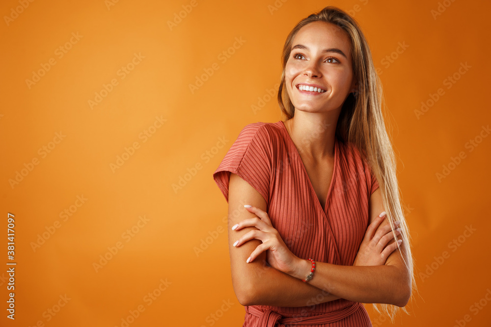 Obraz premium Portrait of a young beautiful happy woman smiling