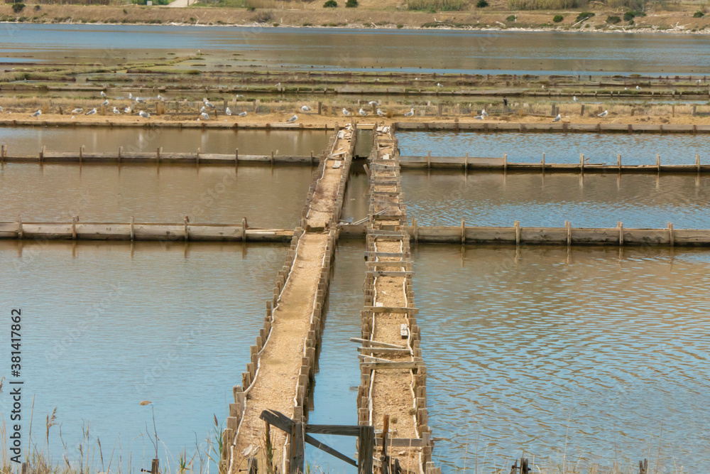 Old Saline salt factory on island Pag. Producing traditional salt from sea water. Old Saline salt factory on island Pag. Producing traditional salt from sea water.