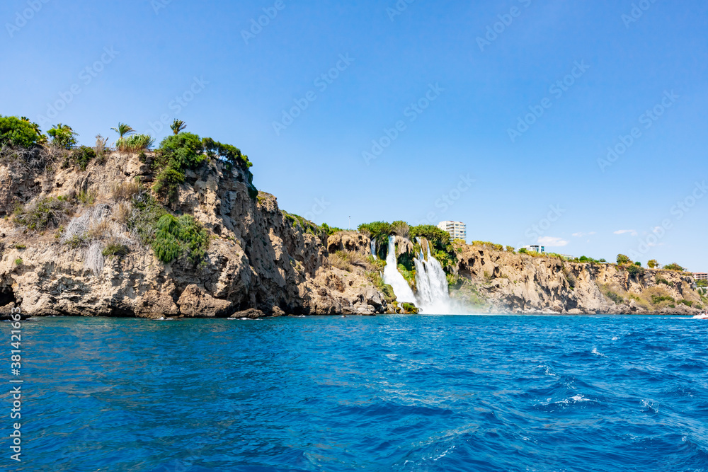 The famous Düden Waterfalls on the coastline of Antalya in Turkey plunge into the sea