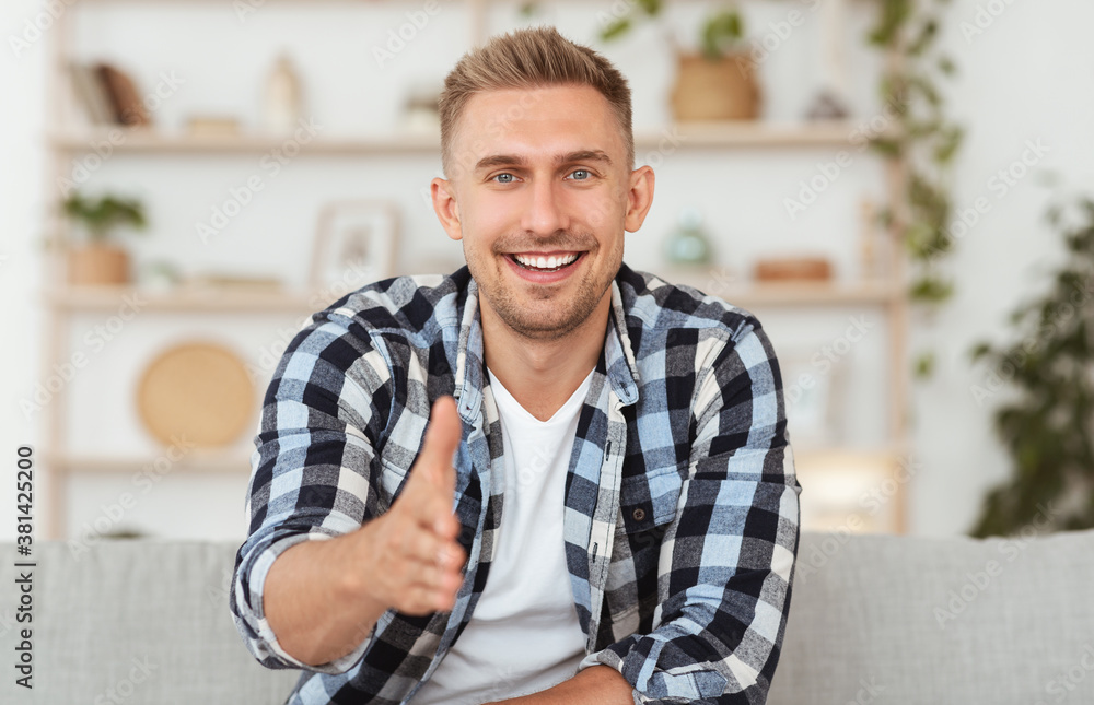 Confident Man Giving Hand For Handshake At Camera Confident Man Giving Hand For Handshake At Camera